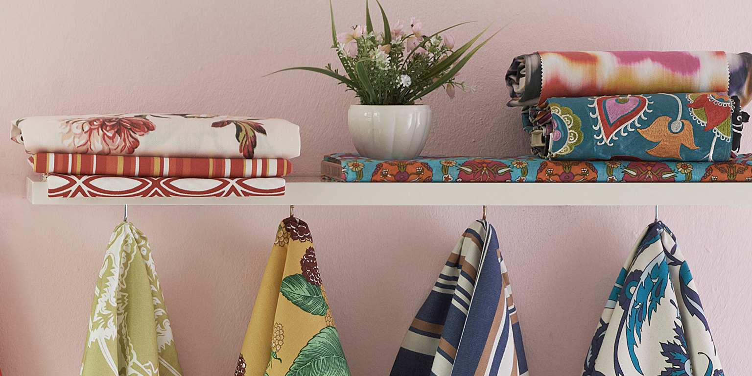 Scarves hanging from shelf