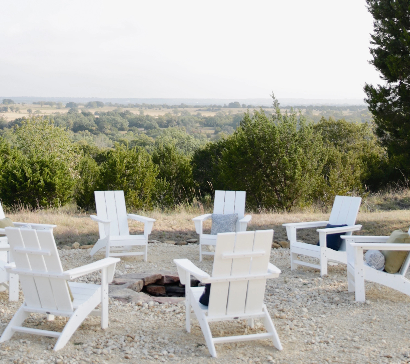 whiter polywood chairs in circle outdoors