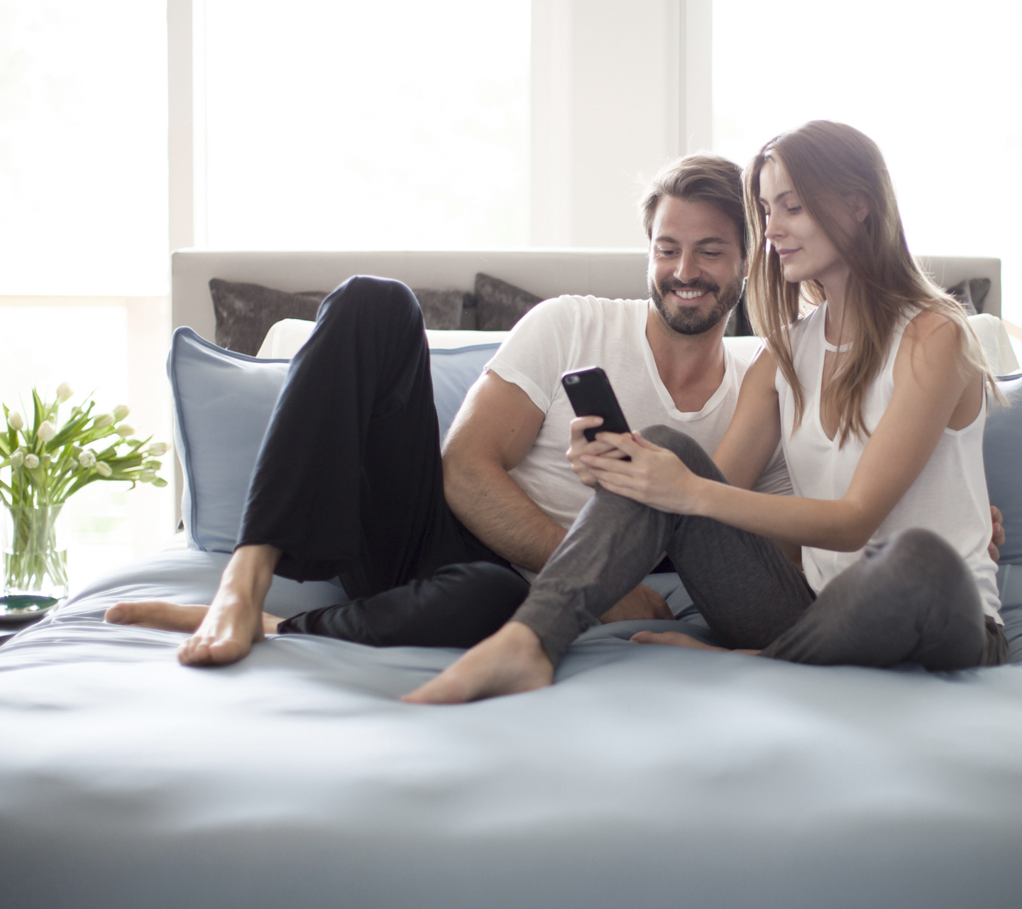 couple in bed with sheex sheets