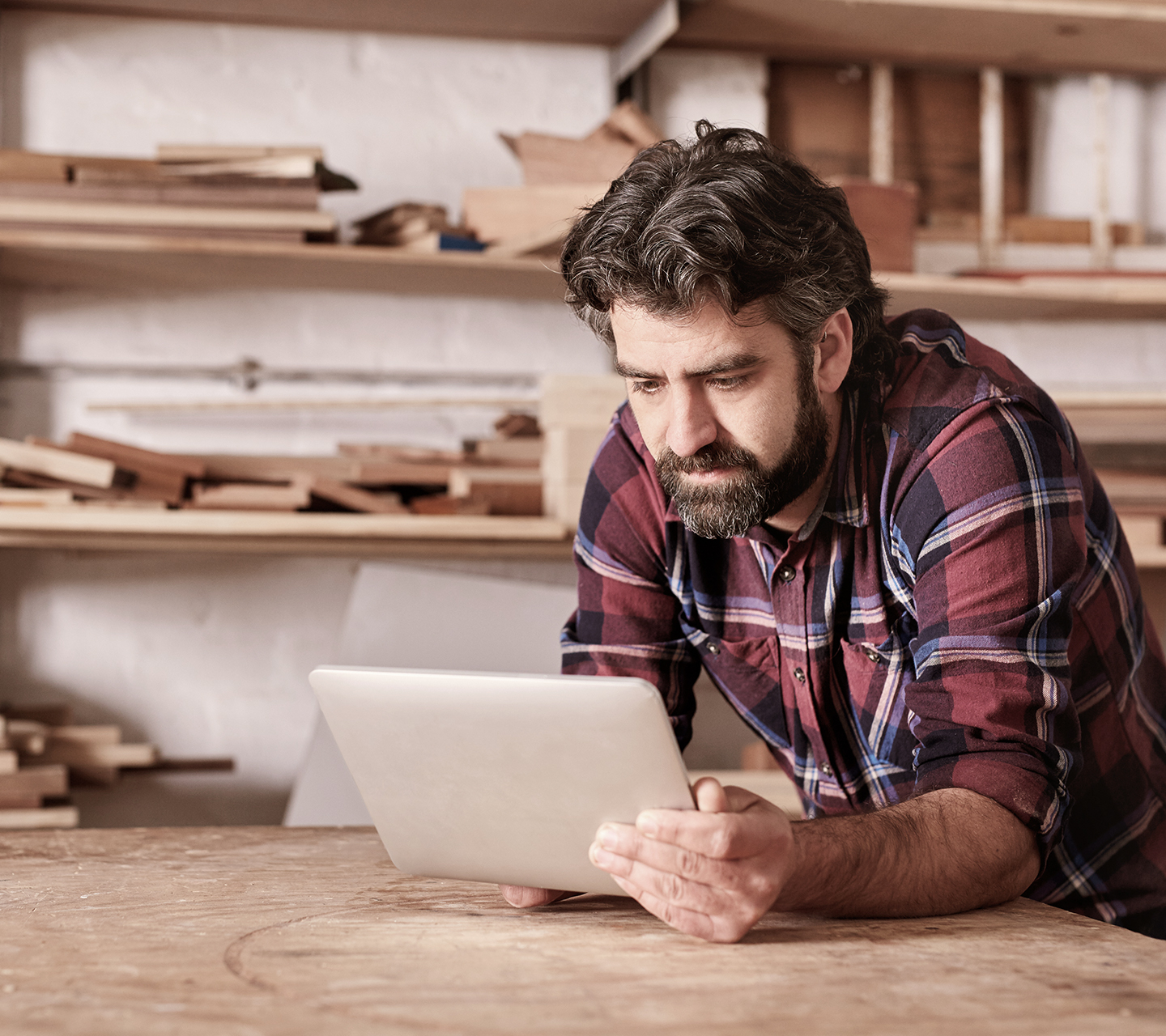 Furniture maker on laptop